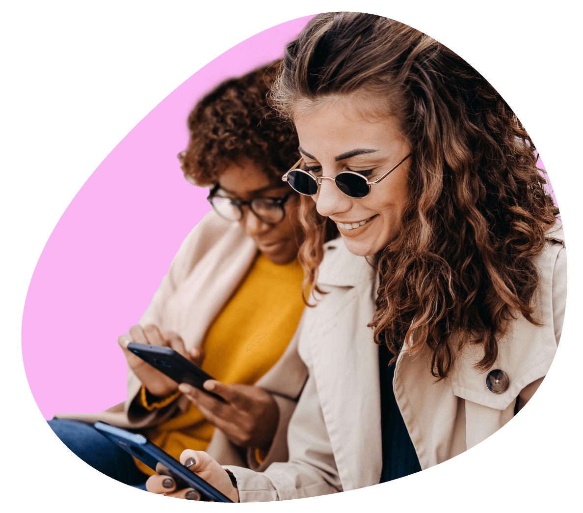 Women looking at health data and research on mobile devices